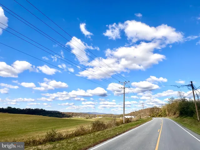 a view of a lake with a city
