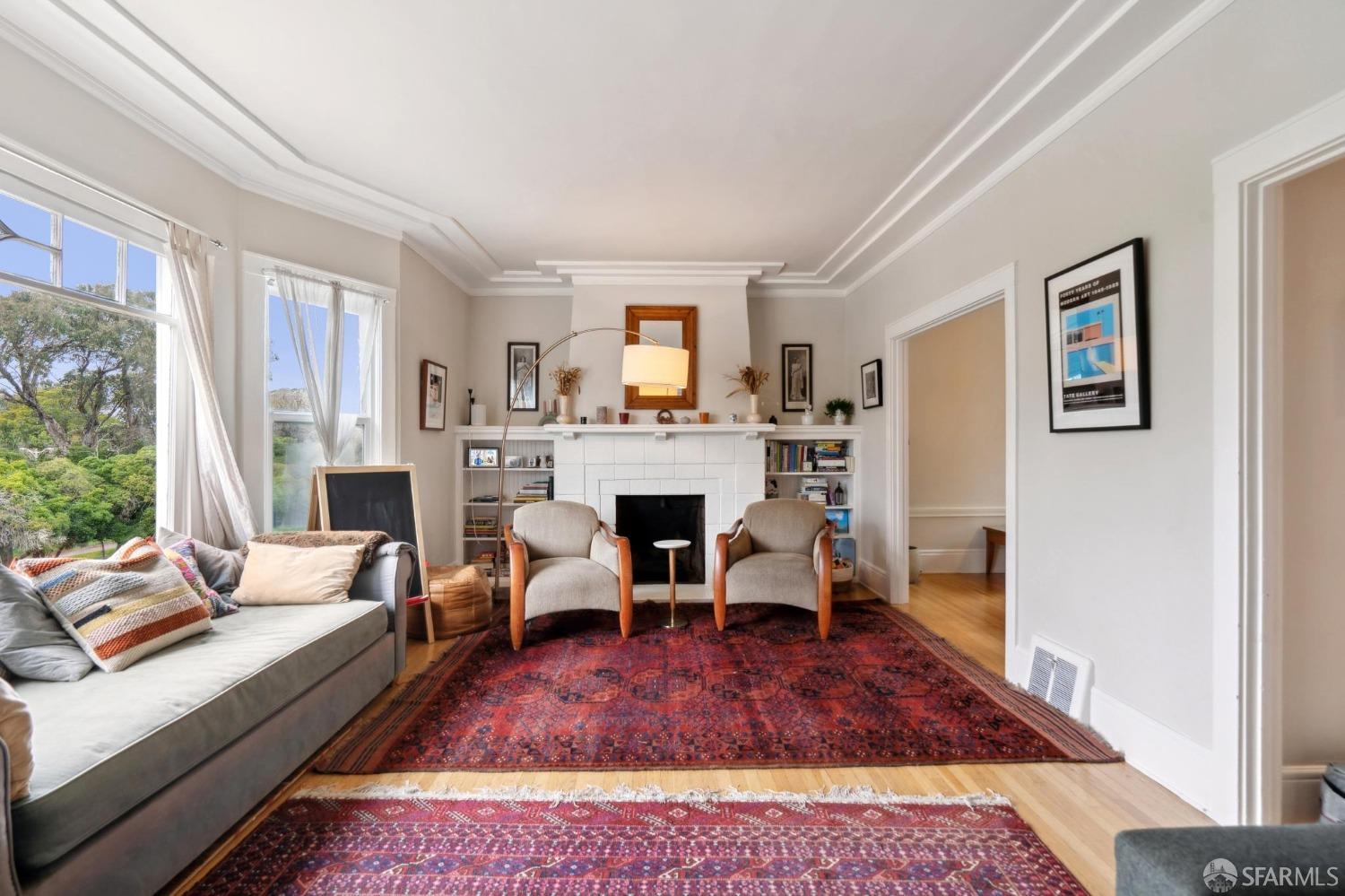368 Funston Avenue San Francisco, CA 94118 - Photo 4 of 16 a living room with fireplace furniture and a large window