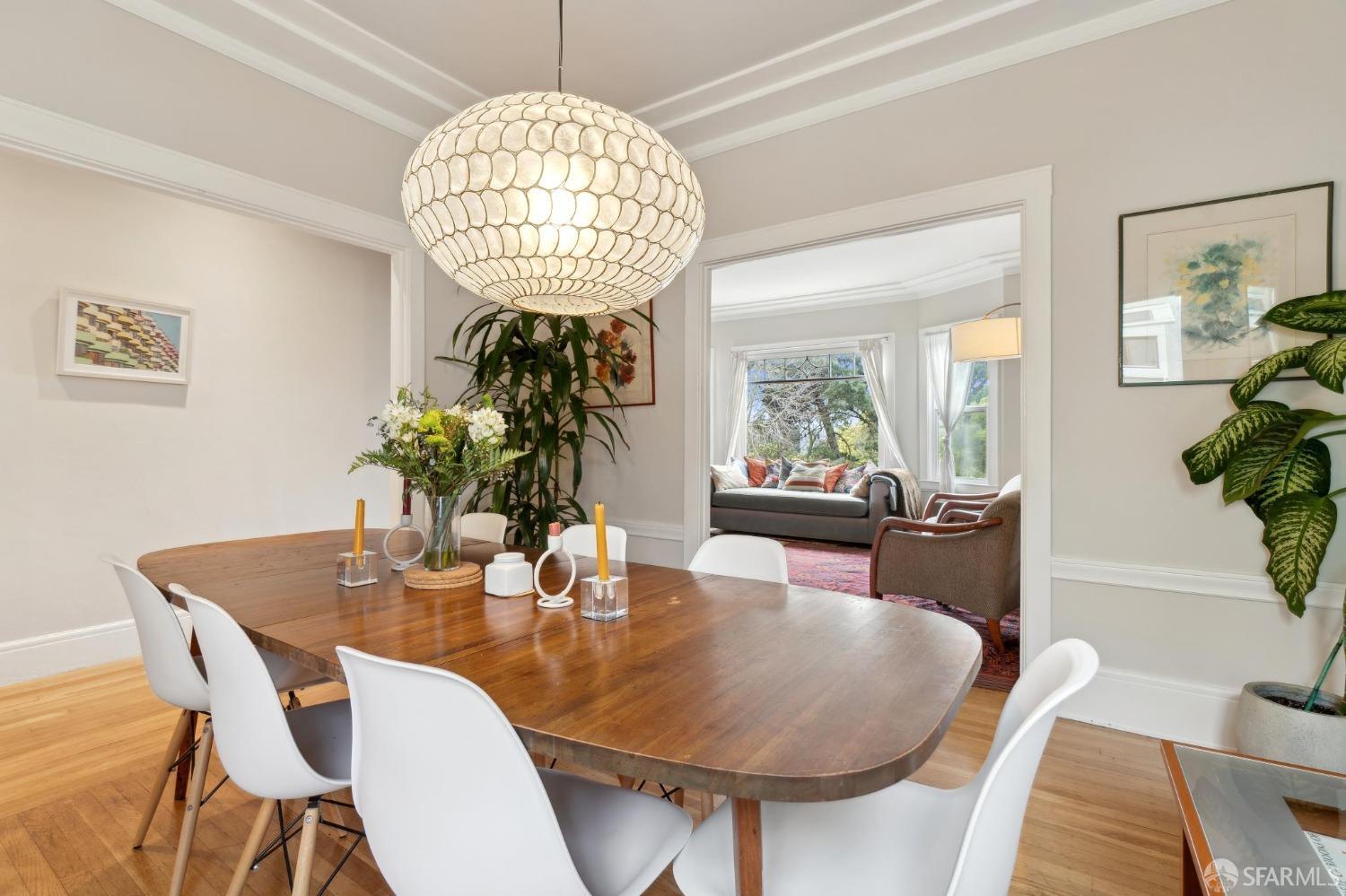 368 Funston Avenue San Francisco, CA 94118 - Photo 5 of 16 a view of a dining room with furniture and chandelier