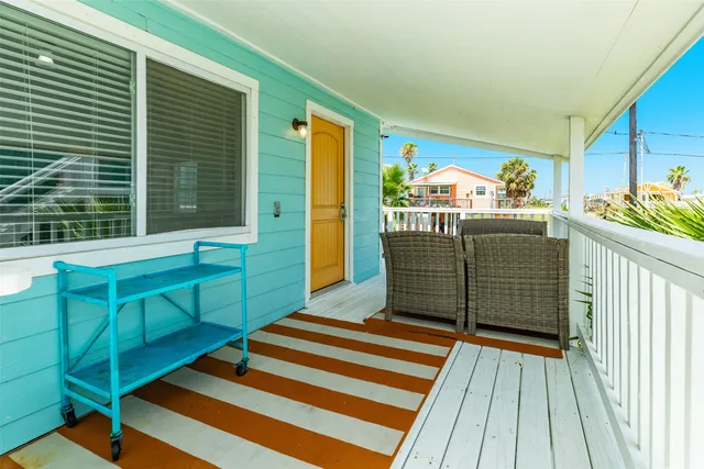 a view of a deck with furniture