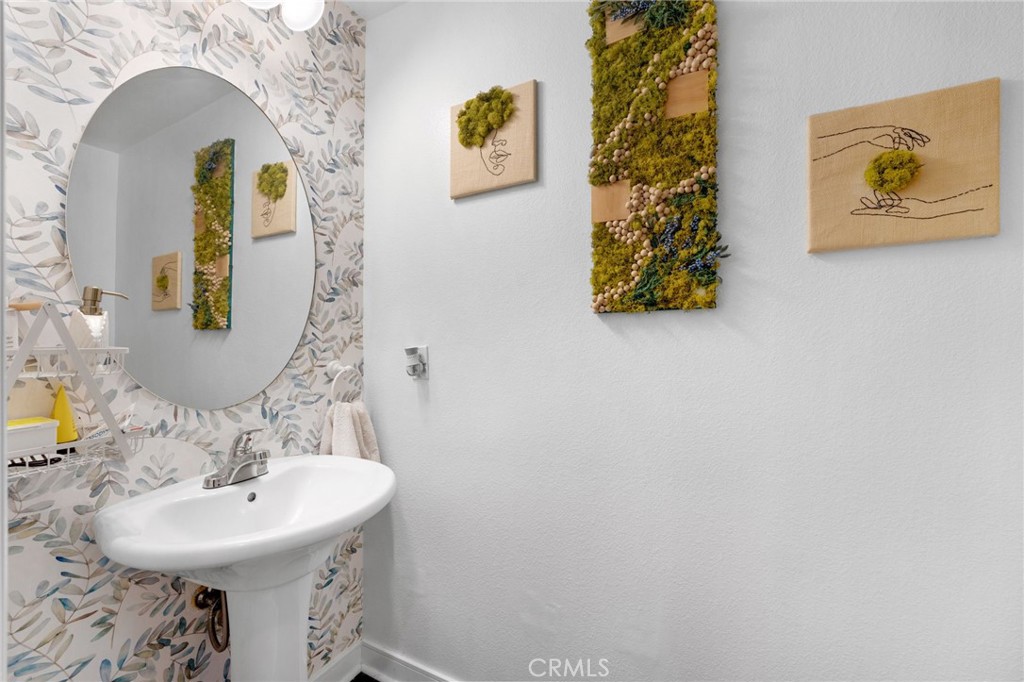 1572 Hackberry Place Chula Vista, CA 91915 - Photo 13 of 38 a bathroom with a sink and a mirror