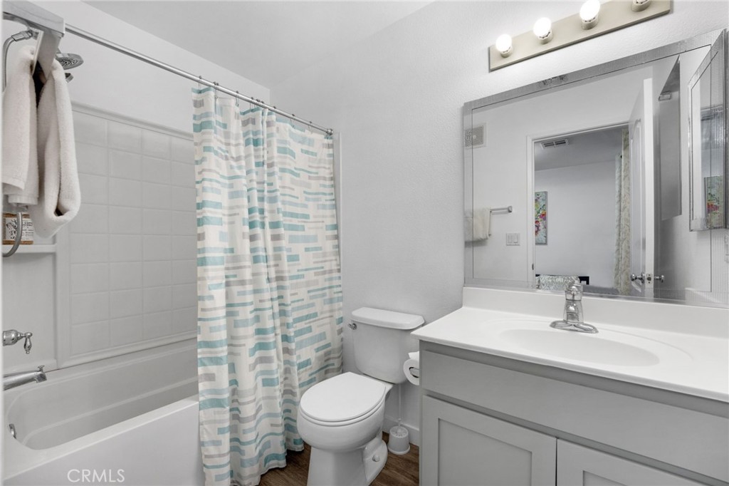 1572 Hackberry Place Chula Vista, CA 91915 - Photo 20 of 38 a bathroom with a sink toilet and shower
