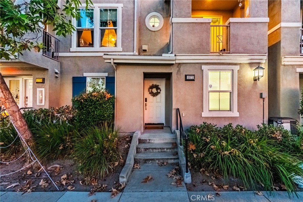1572 Hackberry Place Chula Vista, CA 91915 - Photo 2 of 38 a view of a building with potted plants