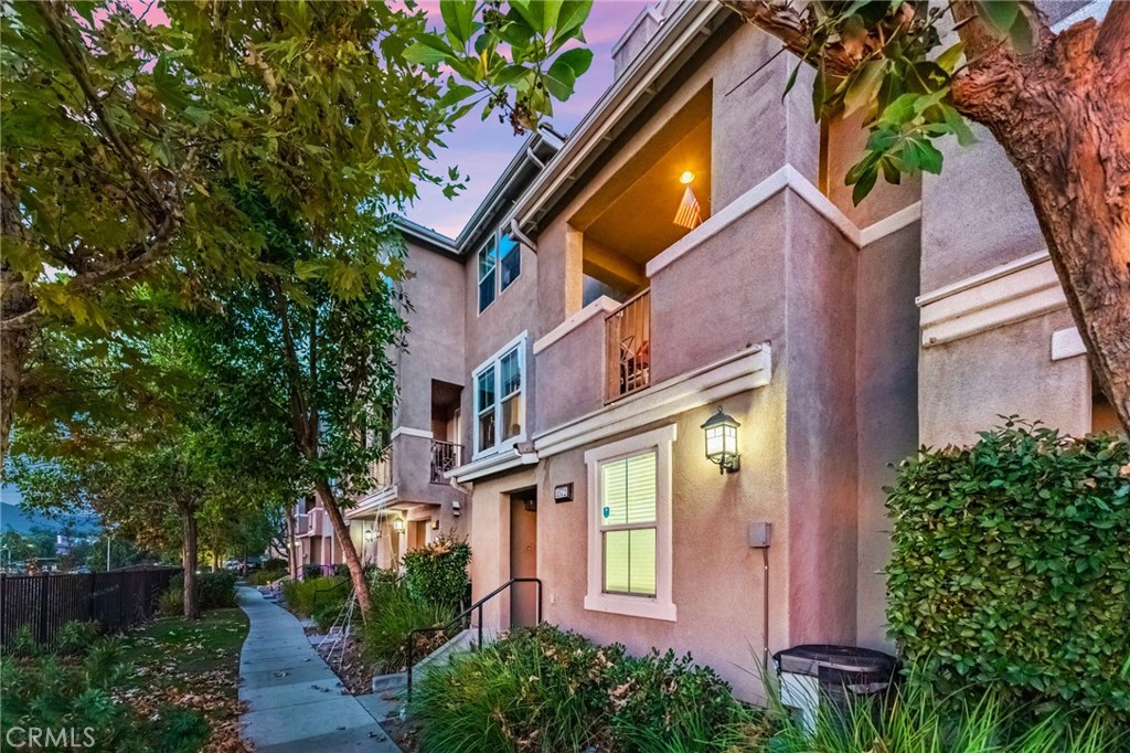 1572 Hackberry Place Chula Vista, CA 91915 - Photo 3 of 38 a front view of a house with garden