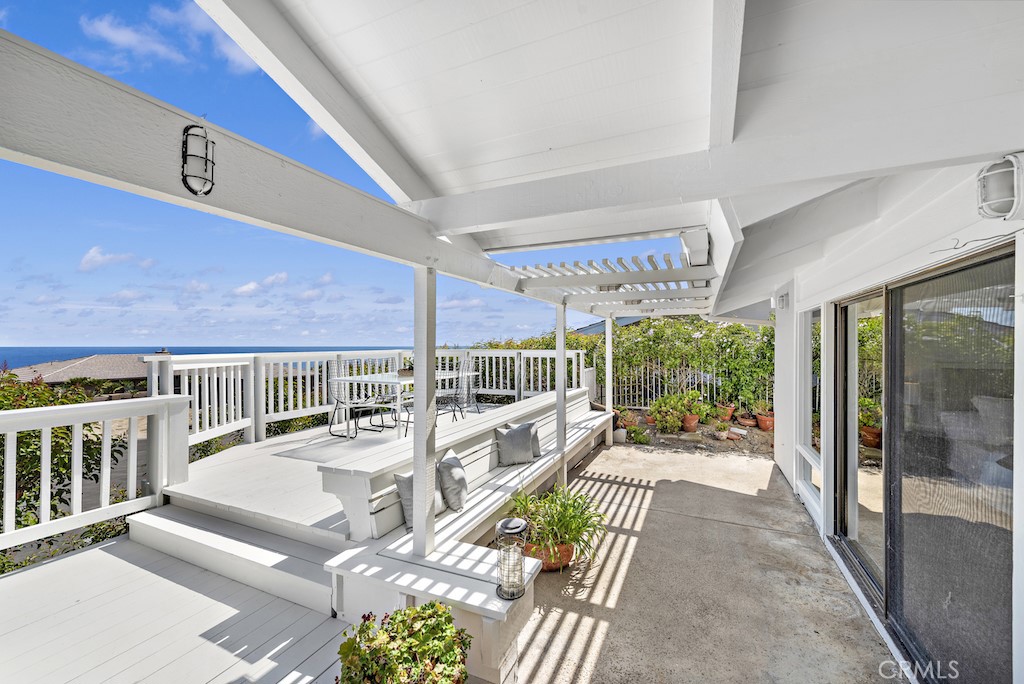 23242 Palawan Circle Dana Point, CA 92629 - Photo 24 of 34 a view of a patio with a table chairs and a patio