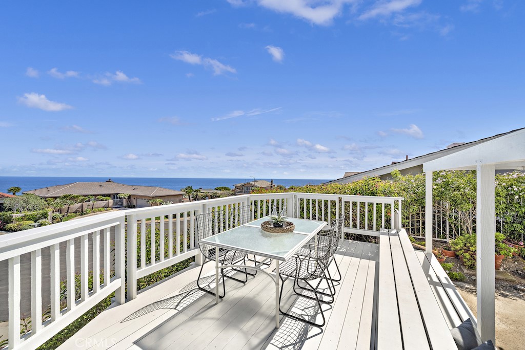 23242 Palawan Circle Dana Point, CA 92629 - Photo 25 of 34 a view of a city from a balcony with furniture