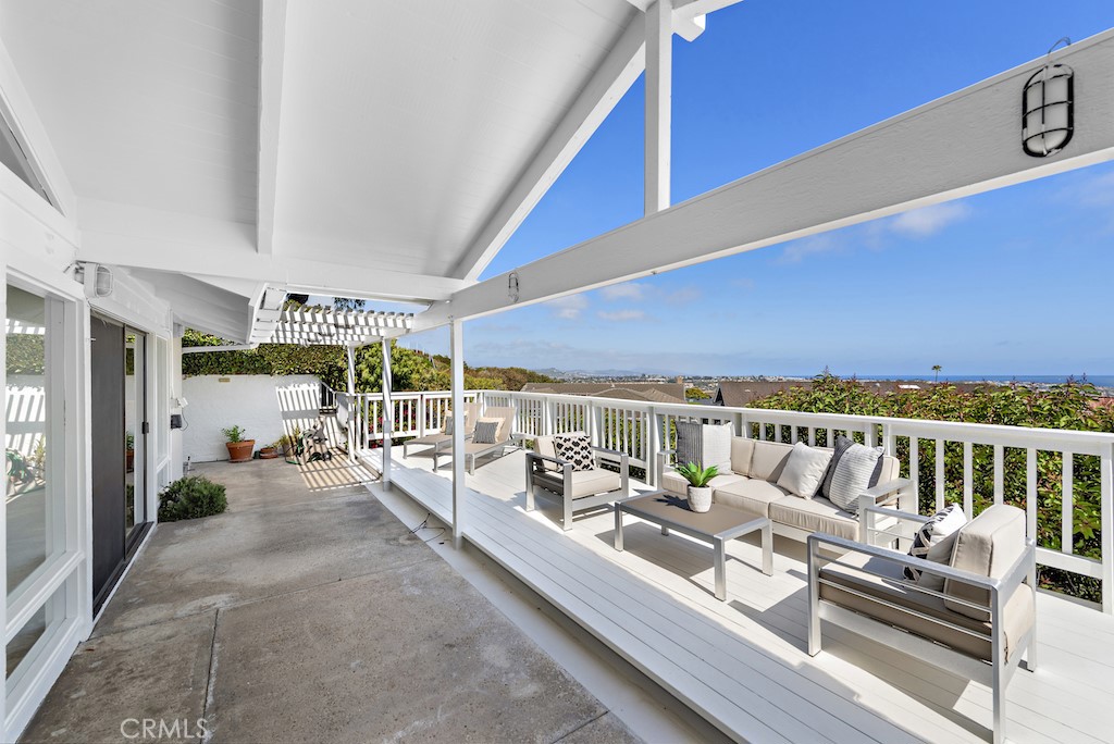 23242 Palawan Circle Dana Point, CA 92629 - Photo 30 of 34 a view of a balcony with couch and chairs