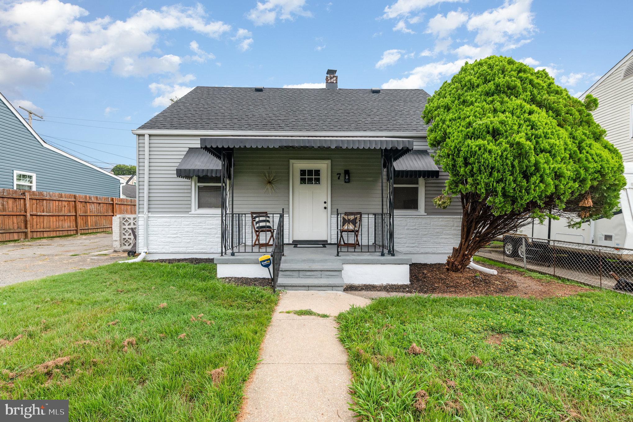 7 Terrace Road Essex, MD 21221 - Photo 1 of 25 a front view of a house with a yard