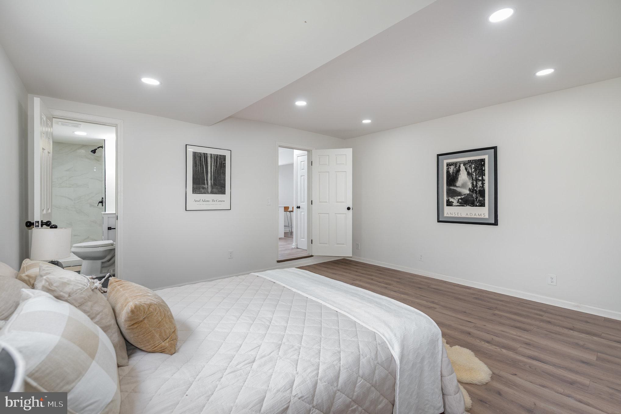 7 Terrace Road Essex, MD 21221 - Photo 11 of 25 a bedroom with a large bed