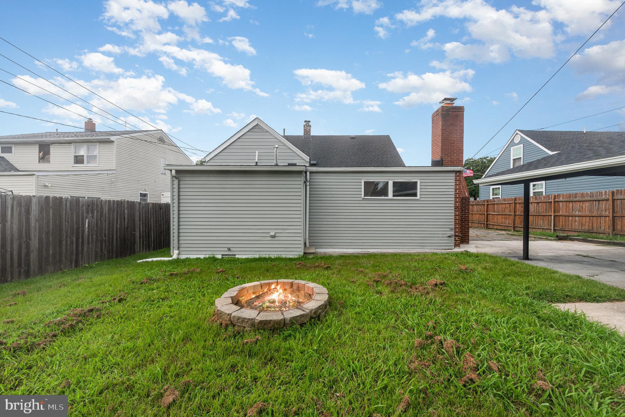 7 Terrace Road Essex, MD 21221 - Photo 21 of 25 a view of backyard of house with wooden floor and fence