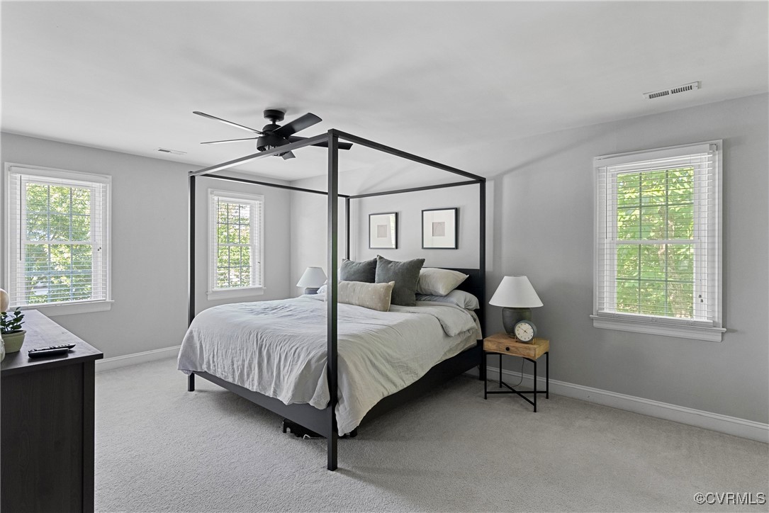 14136 Rigney Drive Midlothian, VA 23113 - Photo 25 of 50 a bedroom with a bed and a window