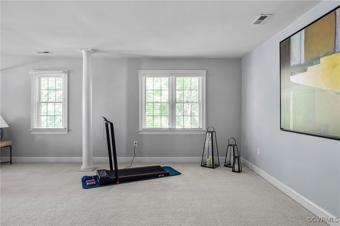 14136 Rigney Drive Midlothian, VA 23113 - Photo 28 of 50 a view of a room with gym equipment and a window