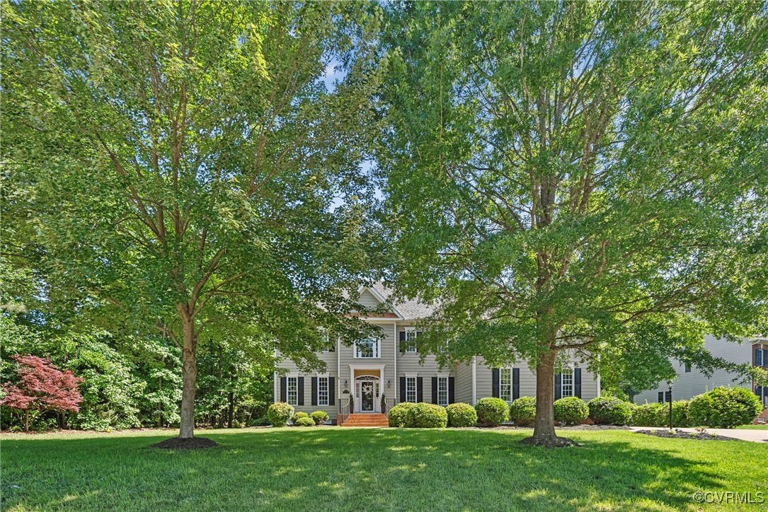 14136 Rigney Drive Midlothian, VA 23113 - Photo 50 of 50 a view of an house with backyard space and garden