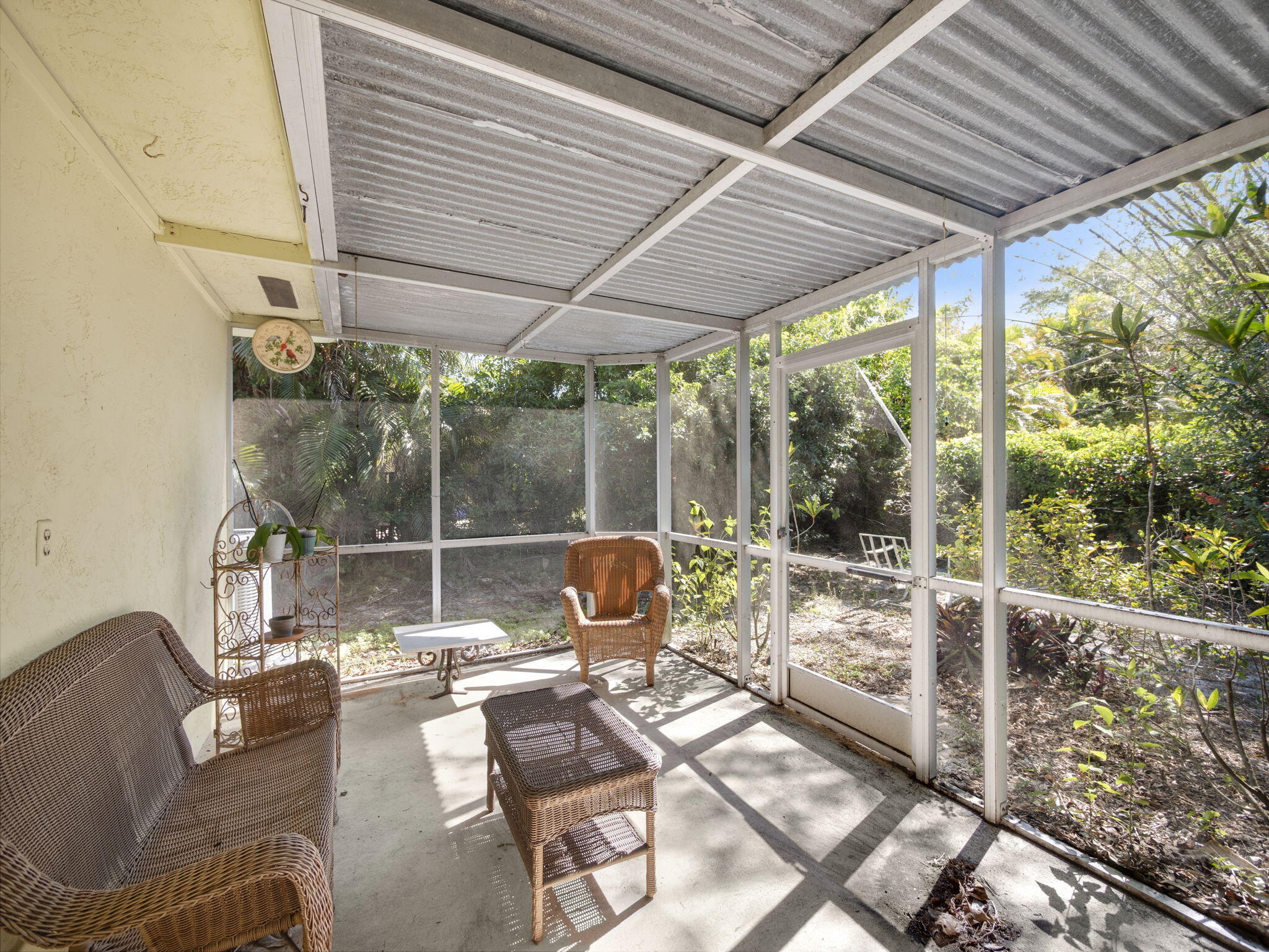 18390 Southeast Courtview Circle Jupiter, FL 33469 - Photo 14 of 16 a patio with patio outdoor seating and yard