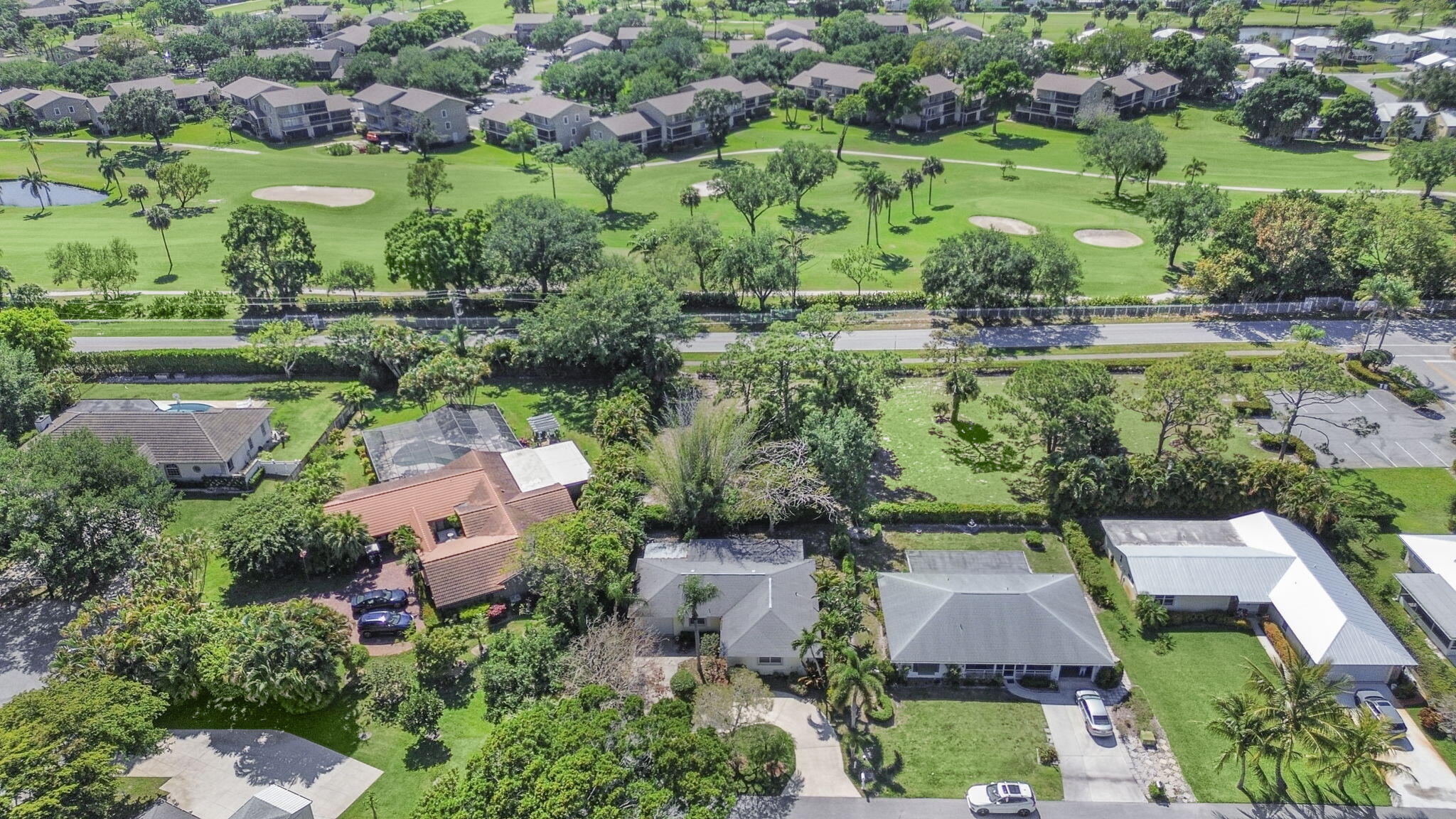 18390 Southeast Courtview Circle Jupiter, FL 33469 - Photo 2 of 16 an aerial view of multiple house
