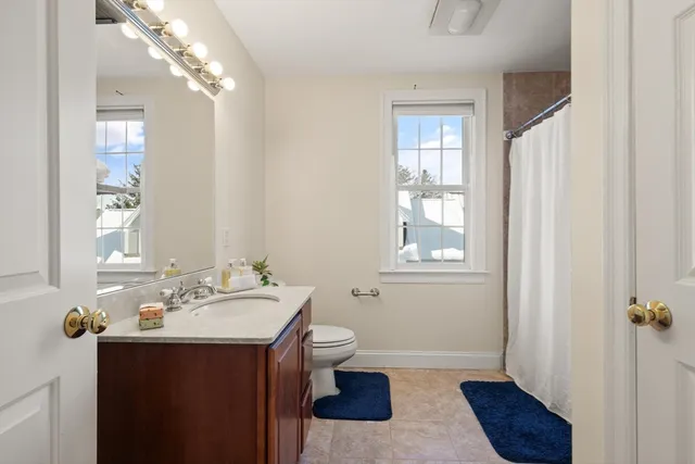 a view of an empty room with stairs