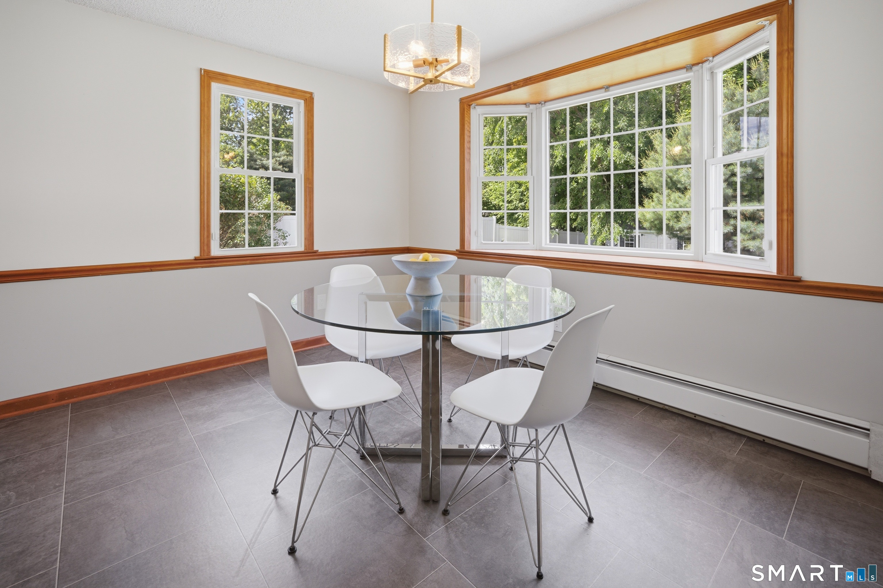 211 Valley View Road Manchester, CT 06040 - Photo 14 of 39 a dining room with furniture and window