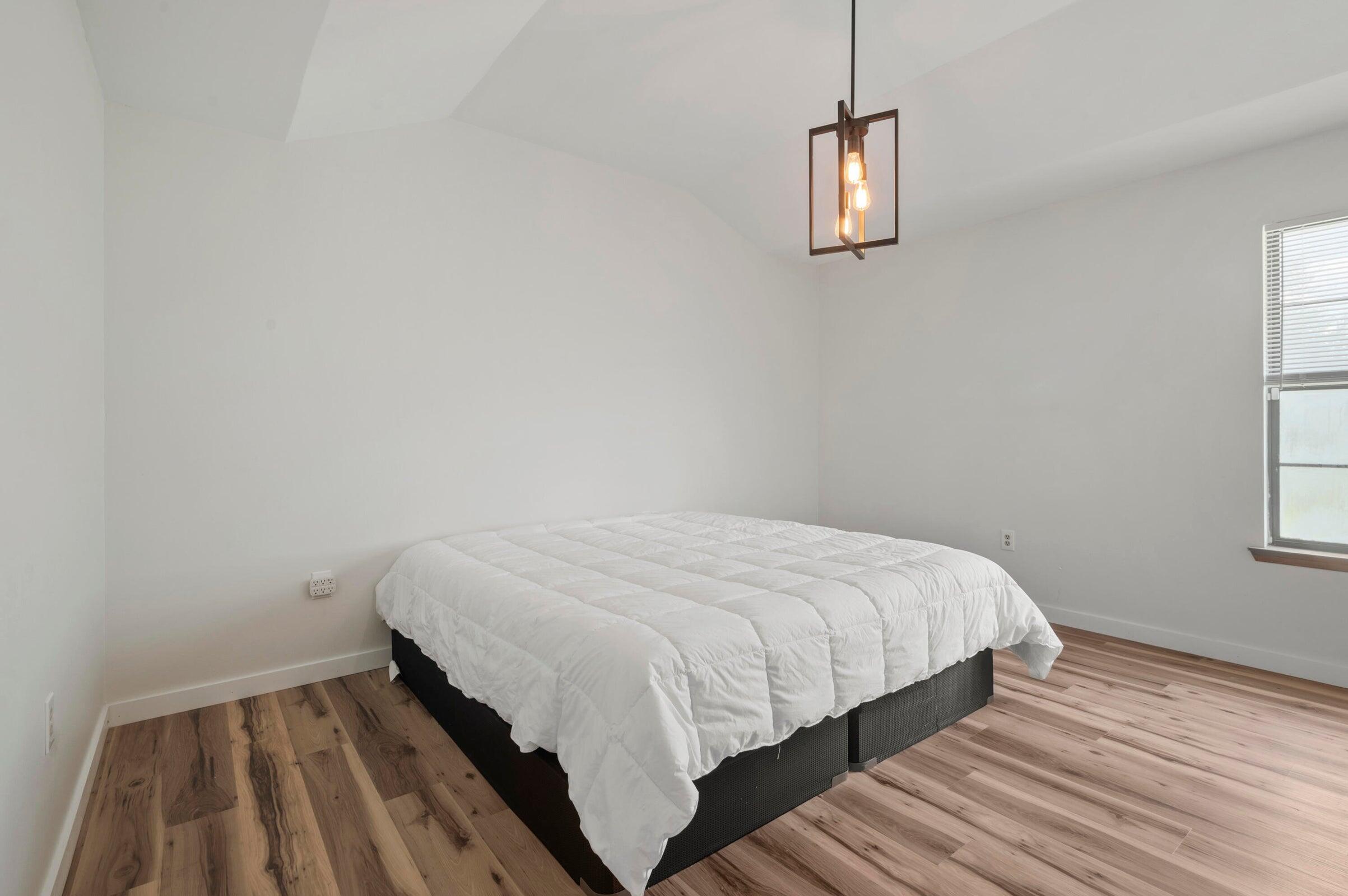 403 Juniper Drive Crestview, FL 32536 - Photo 14 of 25 a bedroom with a bed and a window