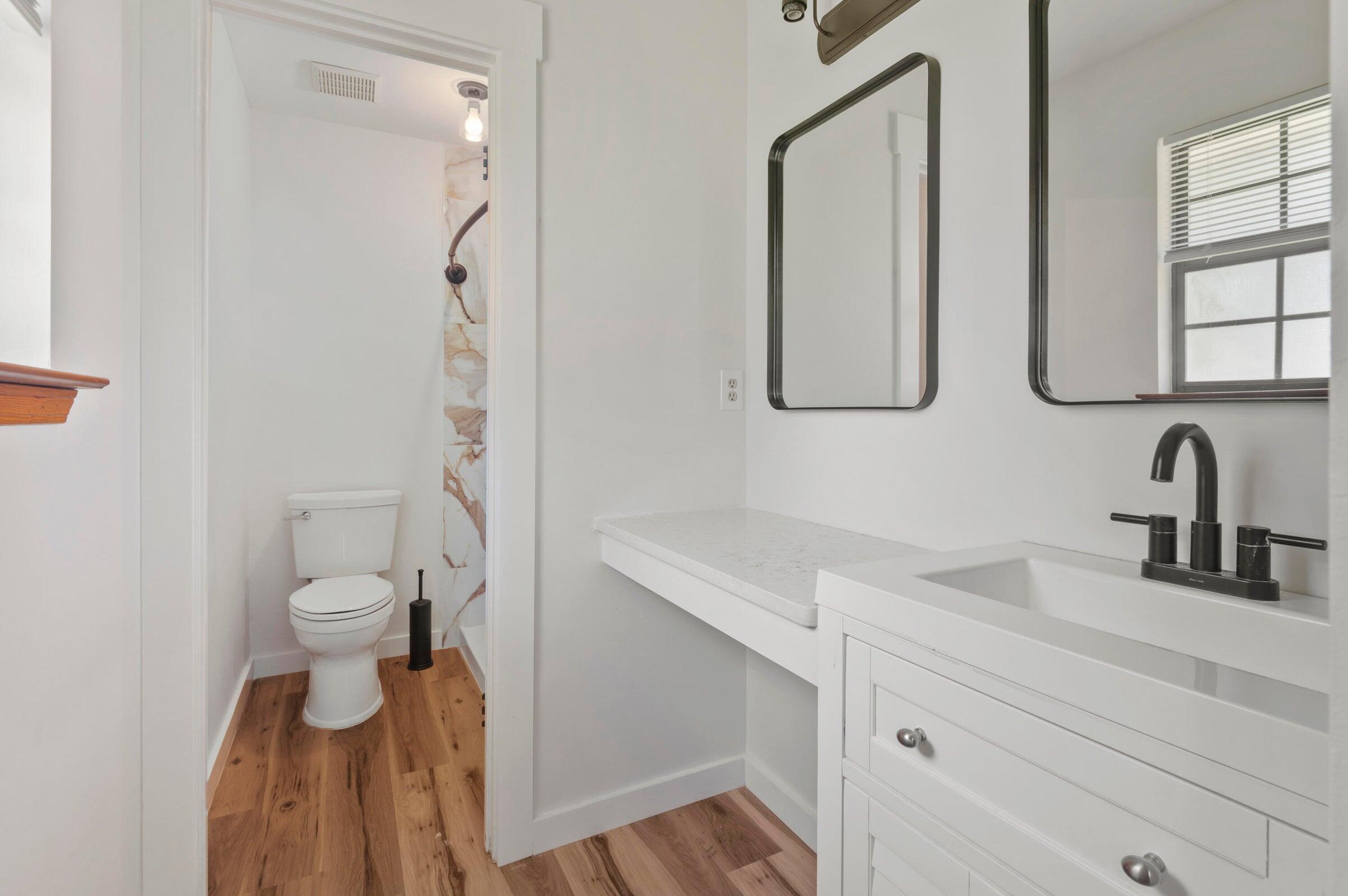 403 Juniper Drive Crestview, FL 32536 - Photo 15 of 25 a bathroom with a toilet sink and mirror