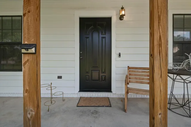 a view of entryway with wooden floor