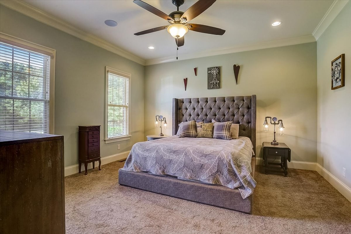 2115 Port Royal Road Adams, TN 37010 - Photo 8 of 49 a bedroom with a bed and window