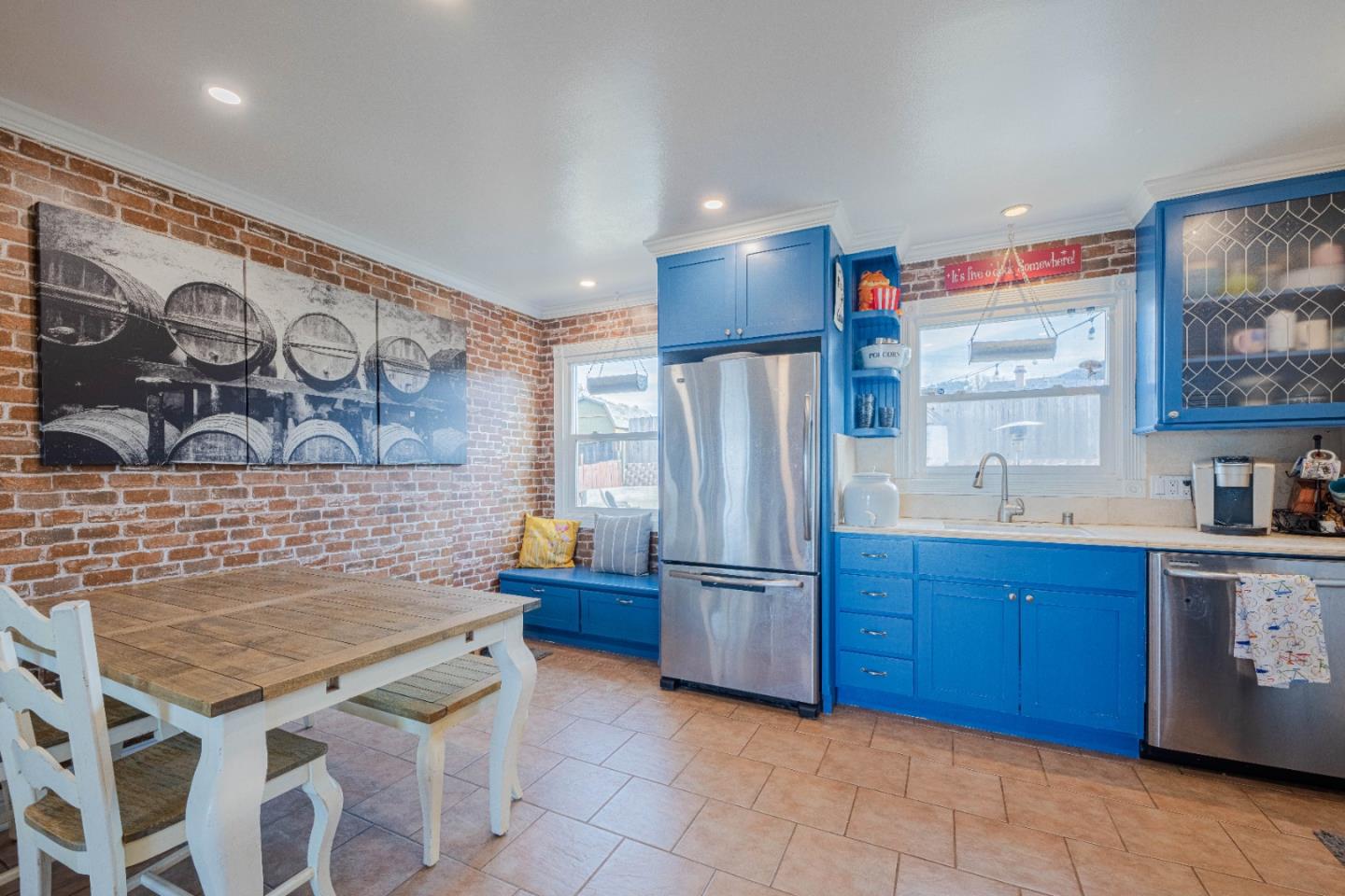 2080 Buchanan Street Seaside, CA 93955 - Photo 12 of 28 a kitchen with stainless steel appliances granite countertop a refrigerator and a stove top oven