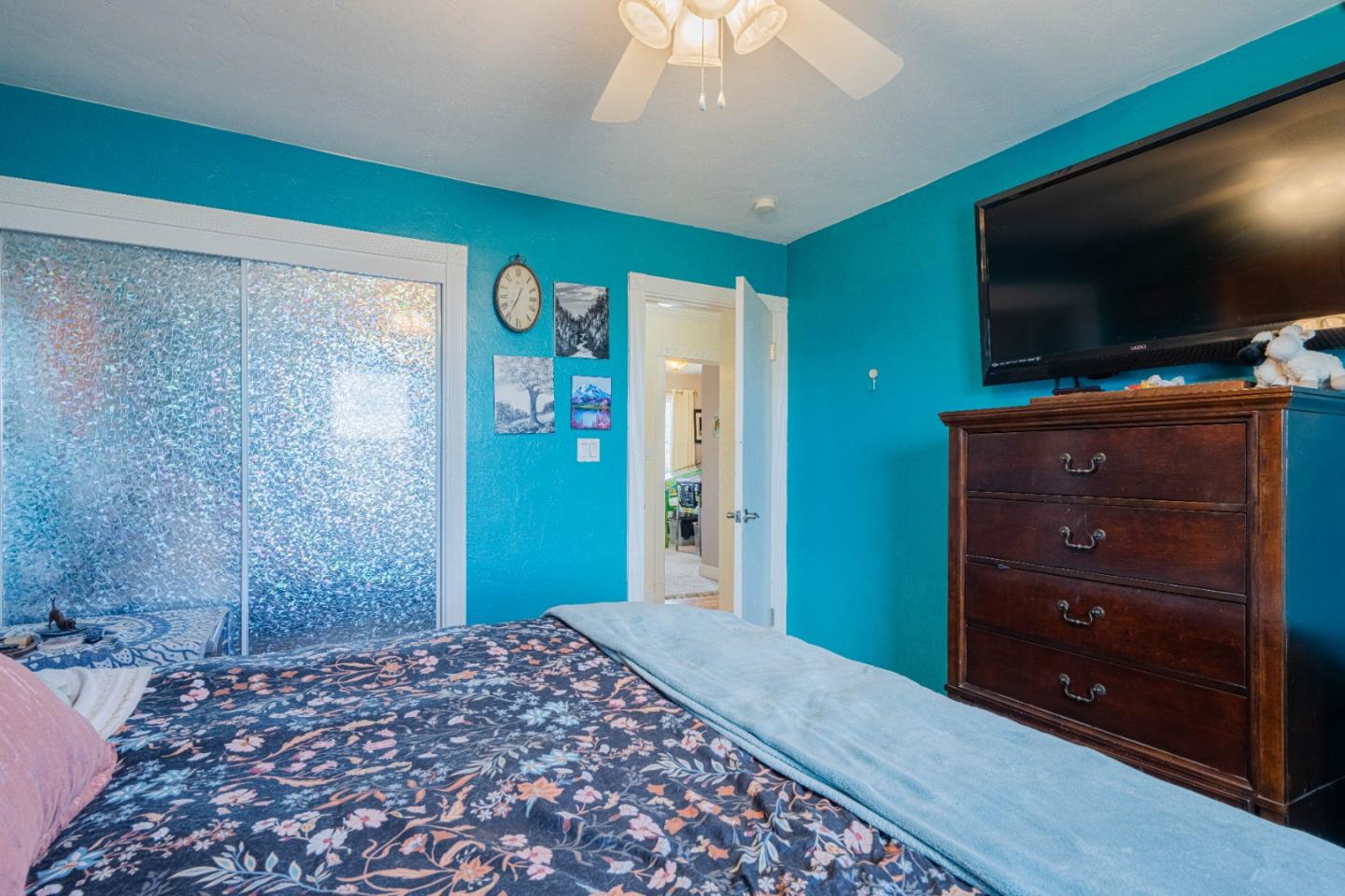 2080 Buchanan Street Seaside, CA 93955 - Photo 19 of 28 a bedroom with a bed and a flat screen tv