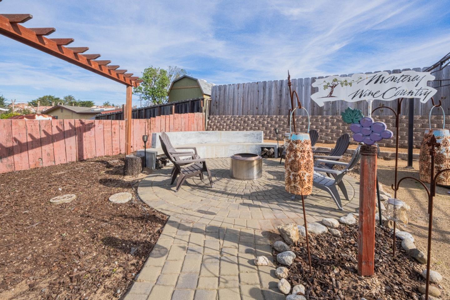 2080 Buchanan Street Seaside, CA 93955 - Photo 27 of 28 a view of a patio with a table and chairs