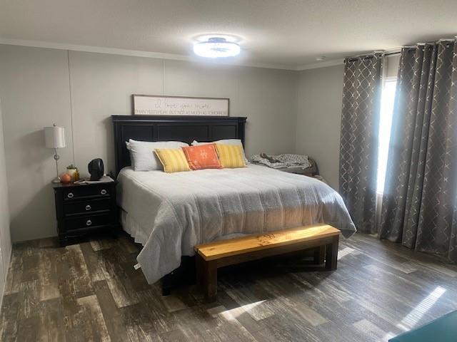 12154 County Road 331A Terrell, TX 75161 - Photo 13 of 31 a bedroom with a bed and a night stand