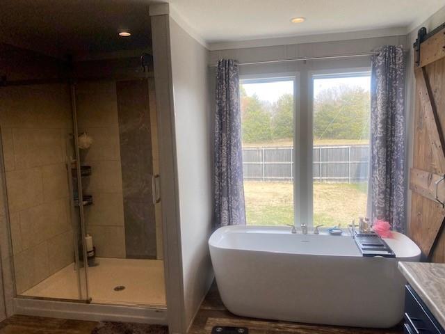 12154 County Road 331A Terrell, TX 75161 - Photo 15 of 31 a living room with a bath tub and a shower