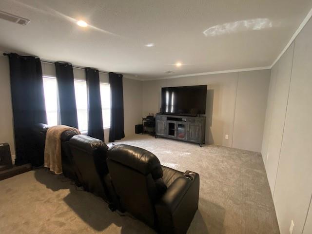 12154 County Road 331A Terrell, TX 75161 - Photo 16 of 31 a living room with furniture a flat screen tv and a refrigerator