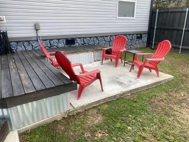 12154 County Road 331A Terrell, TX 75161 - Photo 26 of 31 an outdoor sitting area with furniture and wooden deck