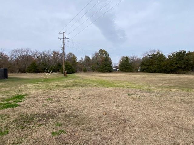 12154 County Road 331A Terrell, TX 75161 - Photo 30 of 31 a view of a field with a tree in the background