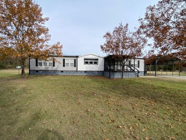 12154 County Road 331A Terrell, TX 75161 - Photo 3 of 31 a view of a house with a big yard and large trees