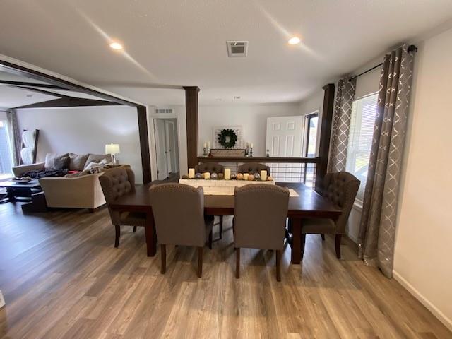 12154 County Road 331A Terrell, TX 75161 - Photo 4 of 31 a view of a dining room with furniture and wooden floor