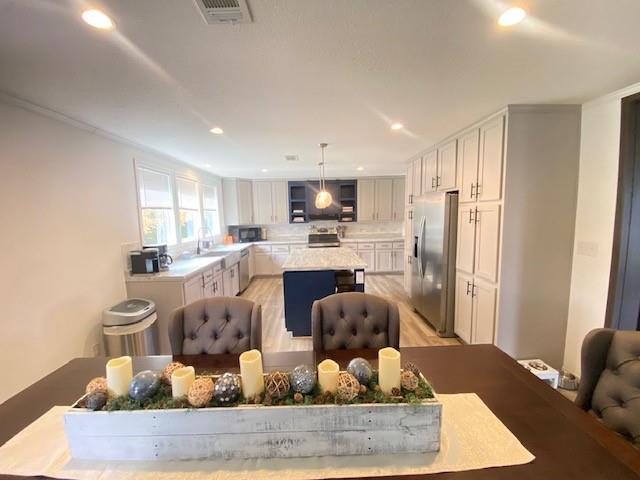 12154 County Road 331A Terrell, TX 75161 - Photo 7 of 31 a kitchen with stainless steel appliances granite countertop a refrigerator sink and cabinets