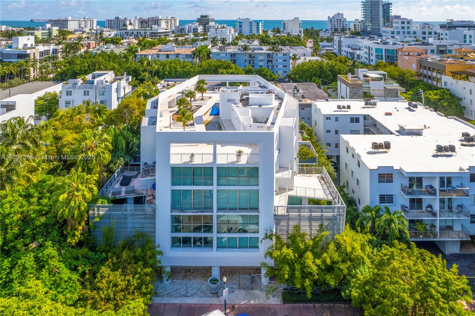 an aerial view of residential building and lake view