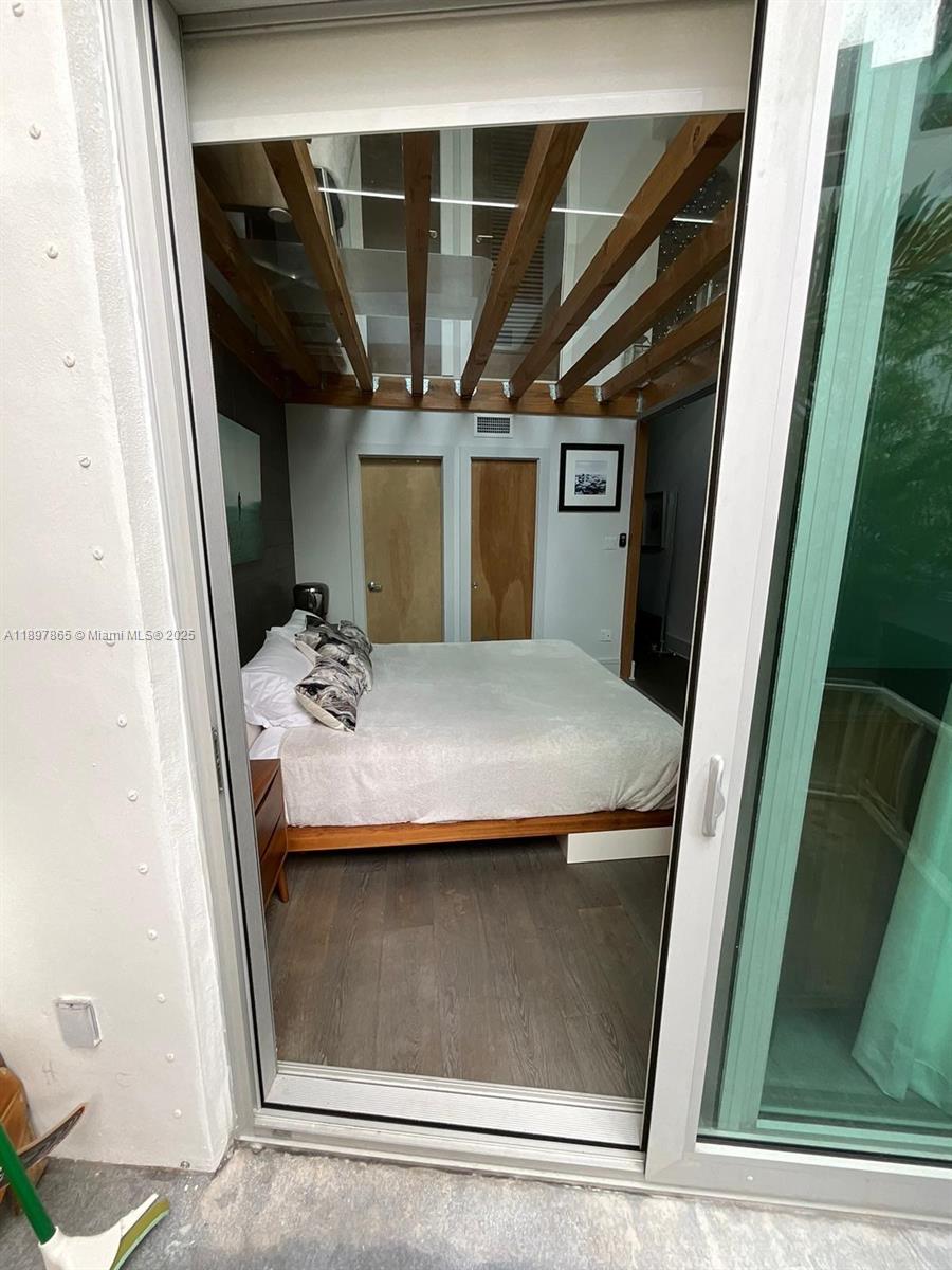 221 Jefferson Avenue, Unit 4 Miami Beach, FL 33139 - Photo 13 of 34 a utility room with dryer and washer