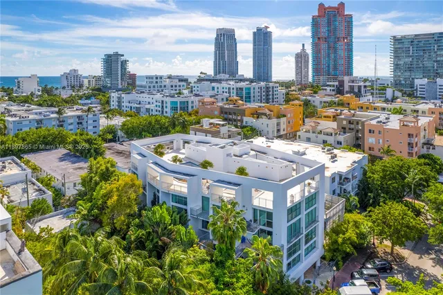 a view of a swimming pool with a lounge chairs