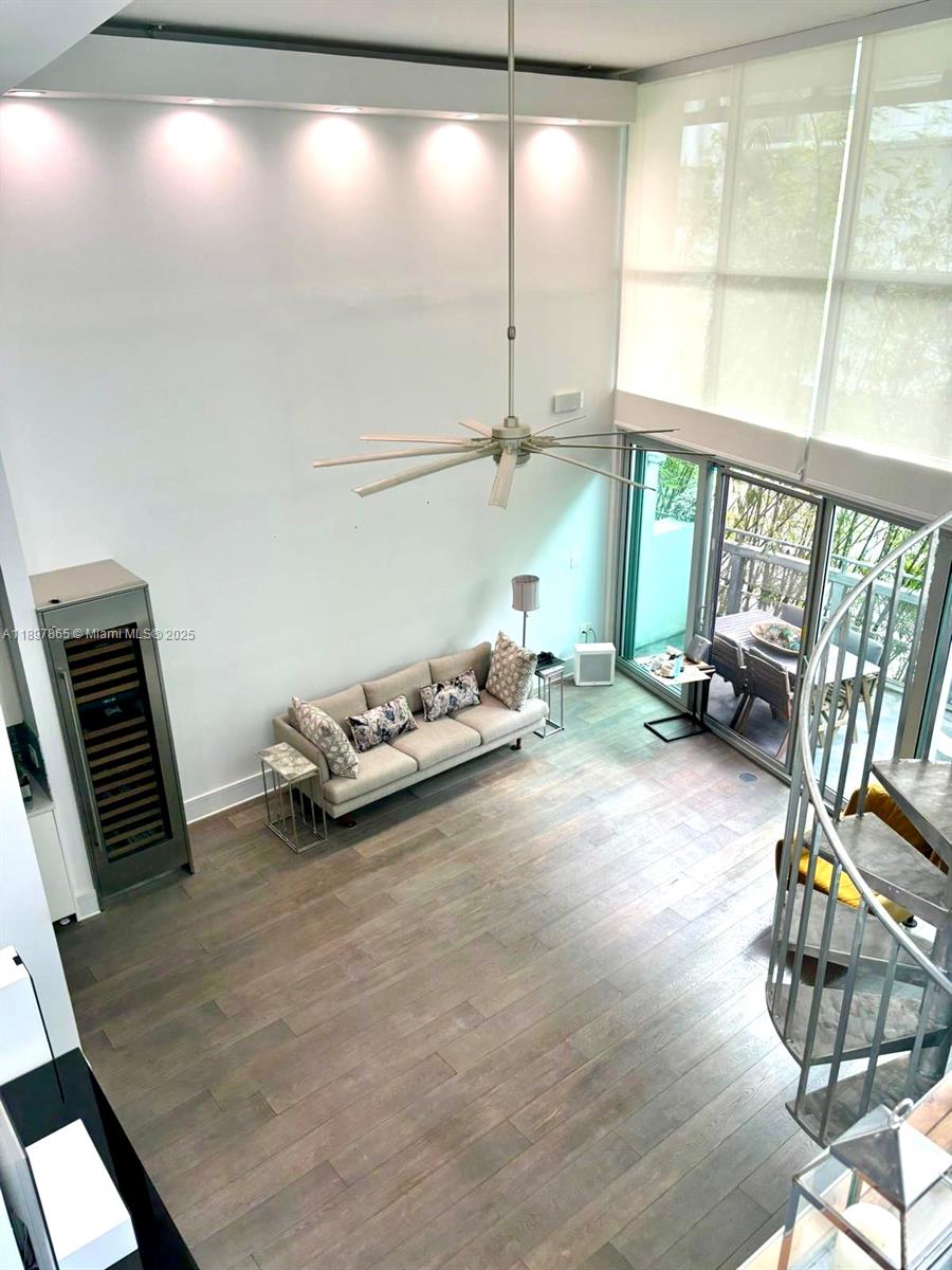 221 Jefferson Avenue, Unit 4 Miami Beach, FL 33139 - Photo 8 of 34 a room with gym equipment and a large window