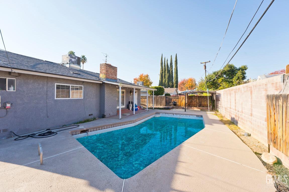 Undisclosed Address Bakersfield, CA 93306 - Photo 20 of 20 a view of a house with backyard and sitting area