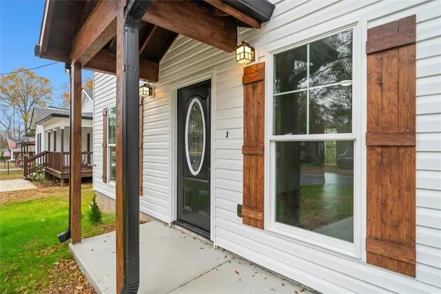 a view of a door and the street view
