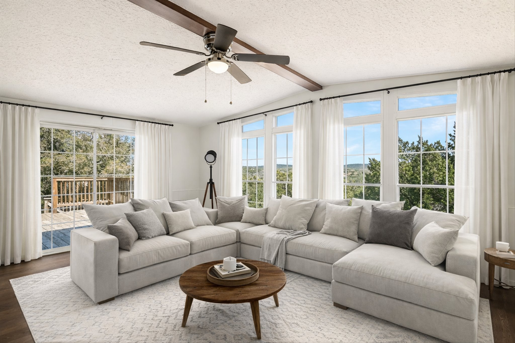 217 Rousey Street Canyon Lake, TX 78133 - Photo 15 of 25 a living room with furniture and a large window