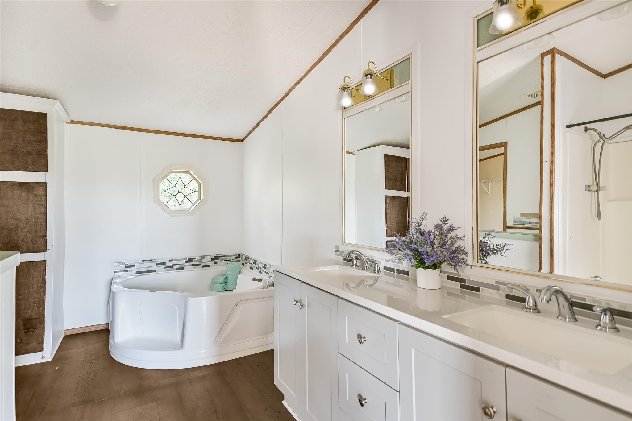 217 Rousey Street Canyon Lake, TX 78133 - Photo 20 of 25 a bathroom with a sink and a mirror