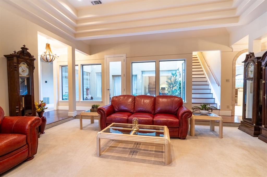 1450 Meandering Way Rockwall, TX 75087 - Photo 7 of 29 a living room with furniture and a large window