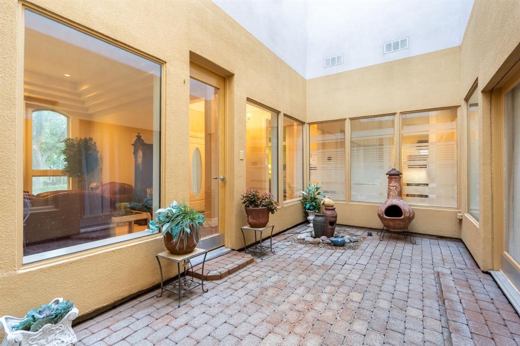 1450 Meandering Way Rockwall, TX 75087 - Photo 8 of 29 a living room with furniture and large windows