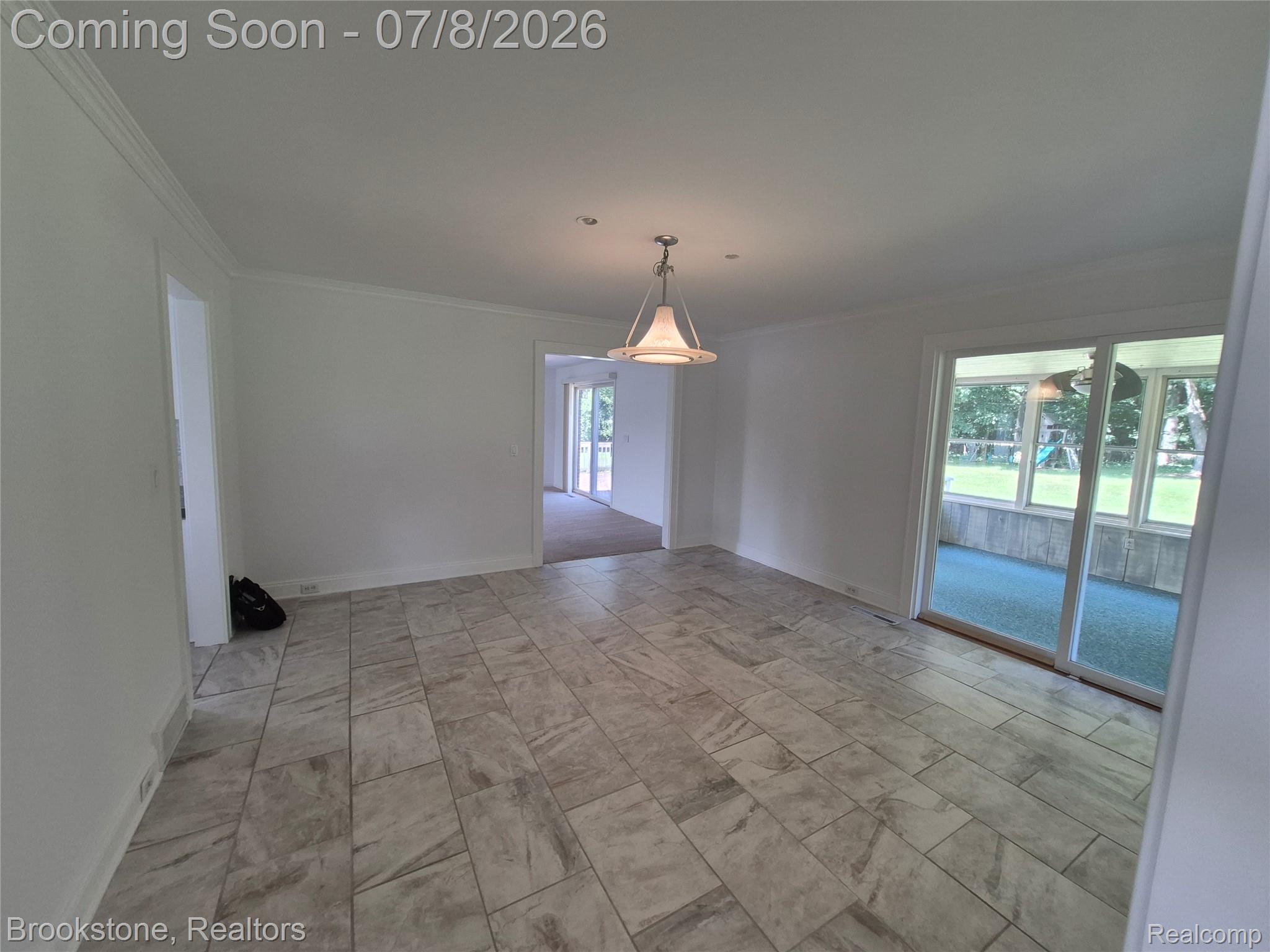 4140 South Henderson Road Davison, MI 48423 - Photo 28 of 98 Formal Dining Room adjacent to one of the two Sunrooms.