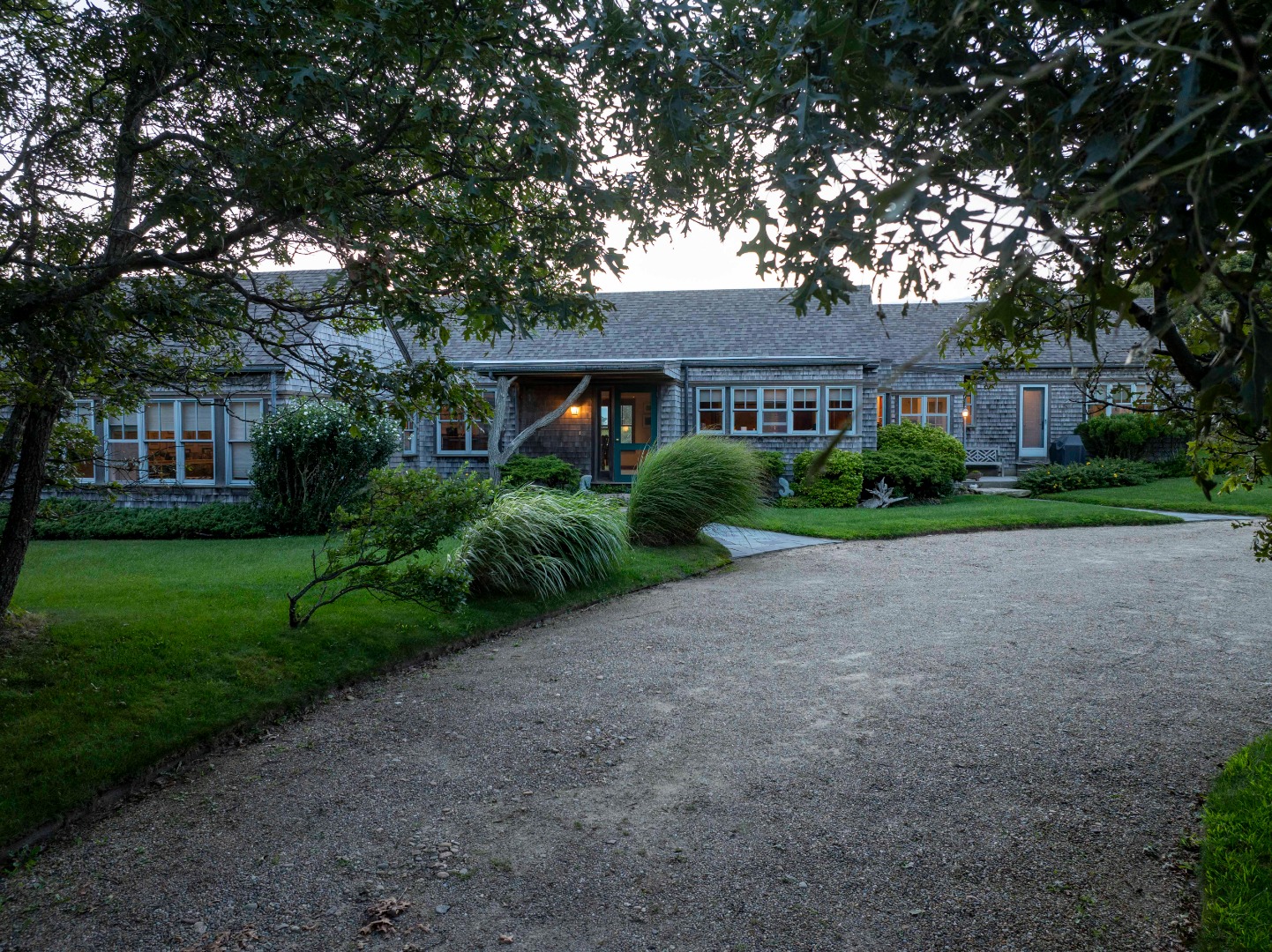 135 Capawock Road West Tisbury, MA 02568 - Photo 11 of 25 a front view of house with yard and green space