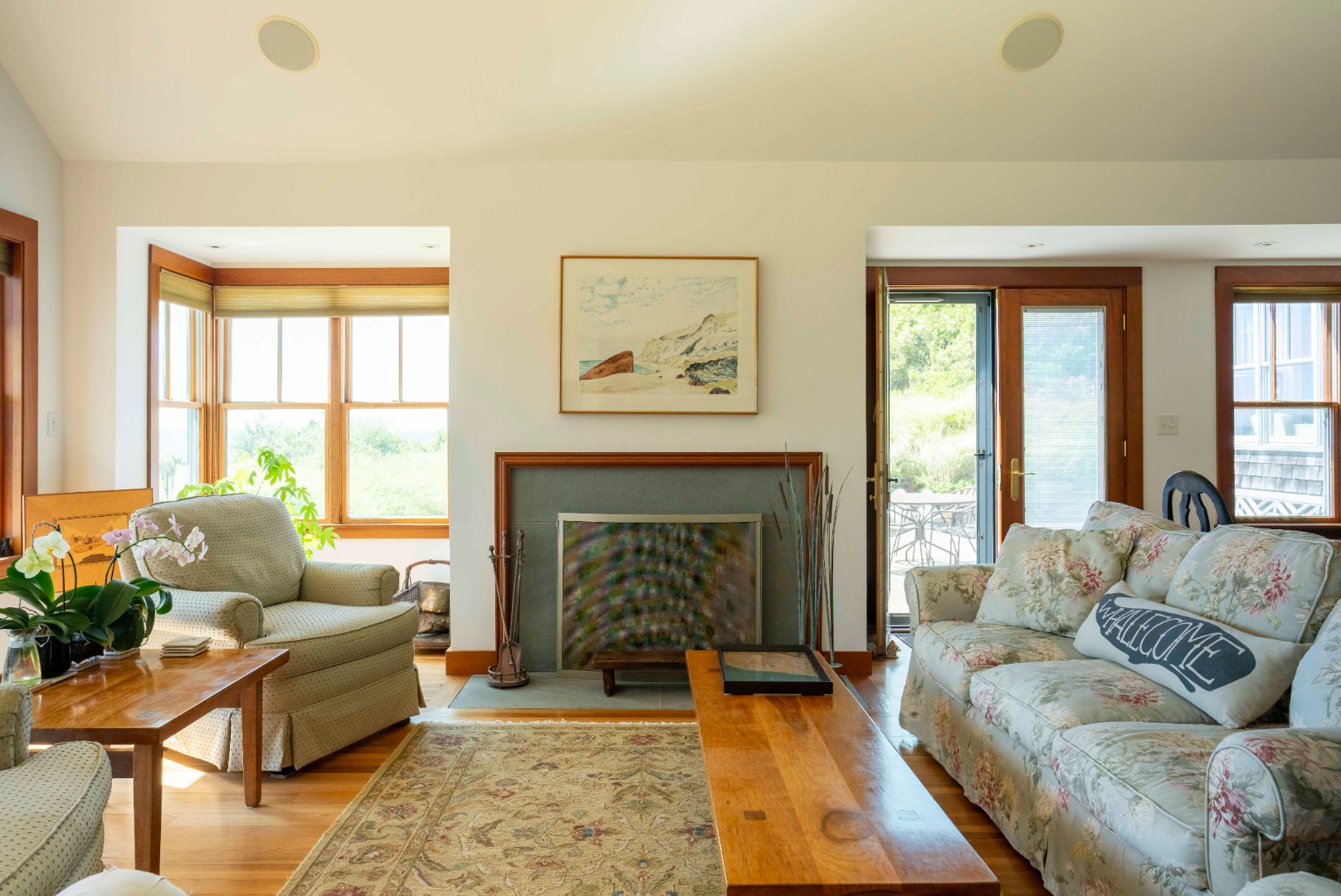 135 Capawock Road West Tisbury, MA 02568 - Photo 13 of 25 a living room with furniture and a fireplace