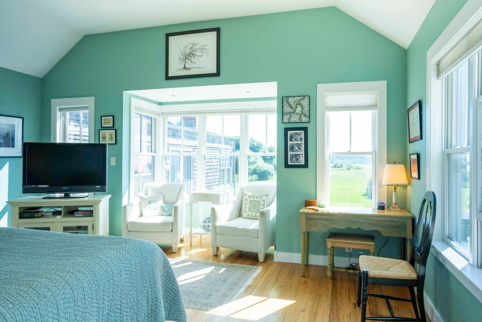 135 Capawock Road West Tisbury, MA 02568 - Photo 22 of 25 a living room with fireplace furniture and a flat screen tv